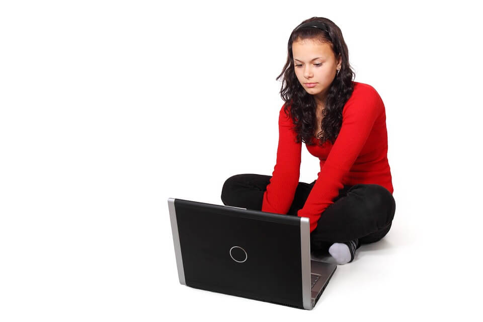 girl using laptop