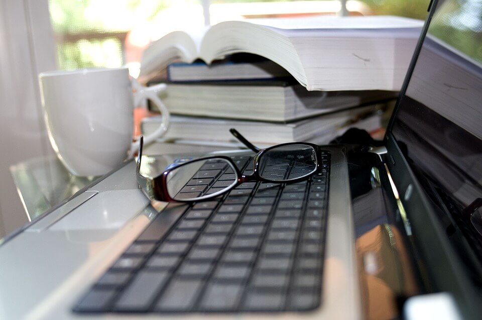 glasses on laptop